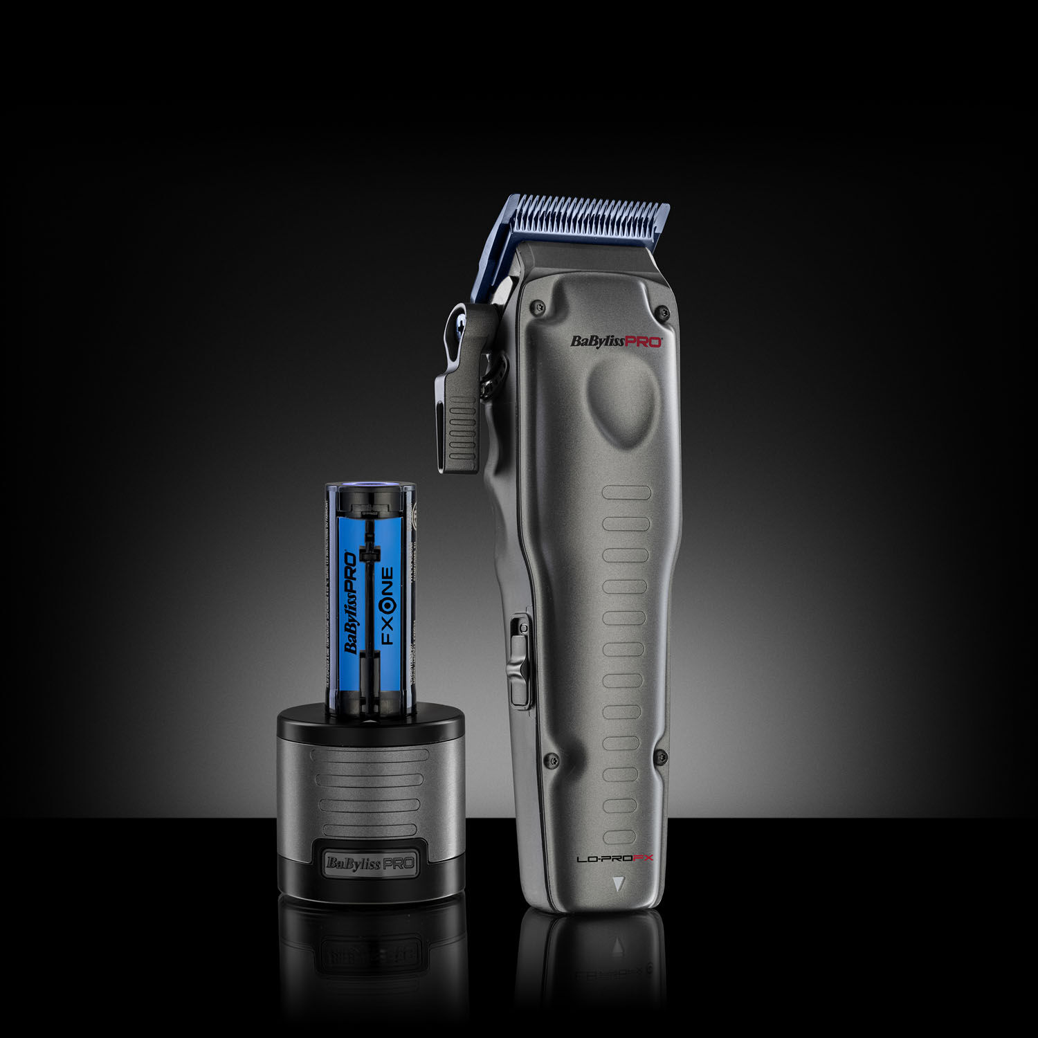 FXONE LO-PRO Clipper Grey and charger on black background